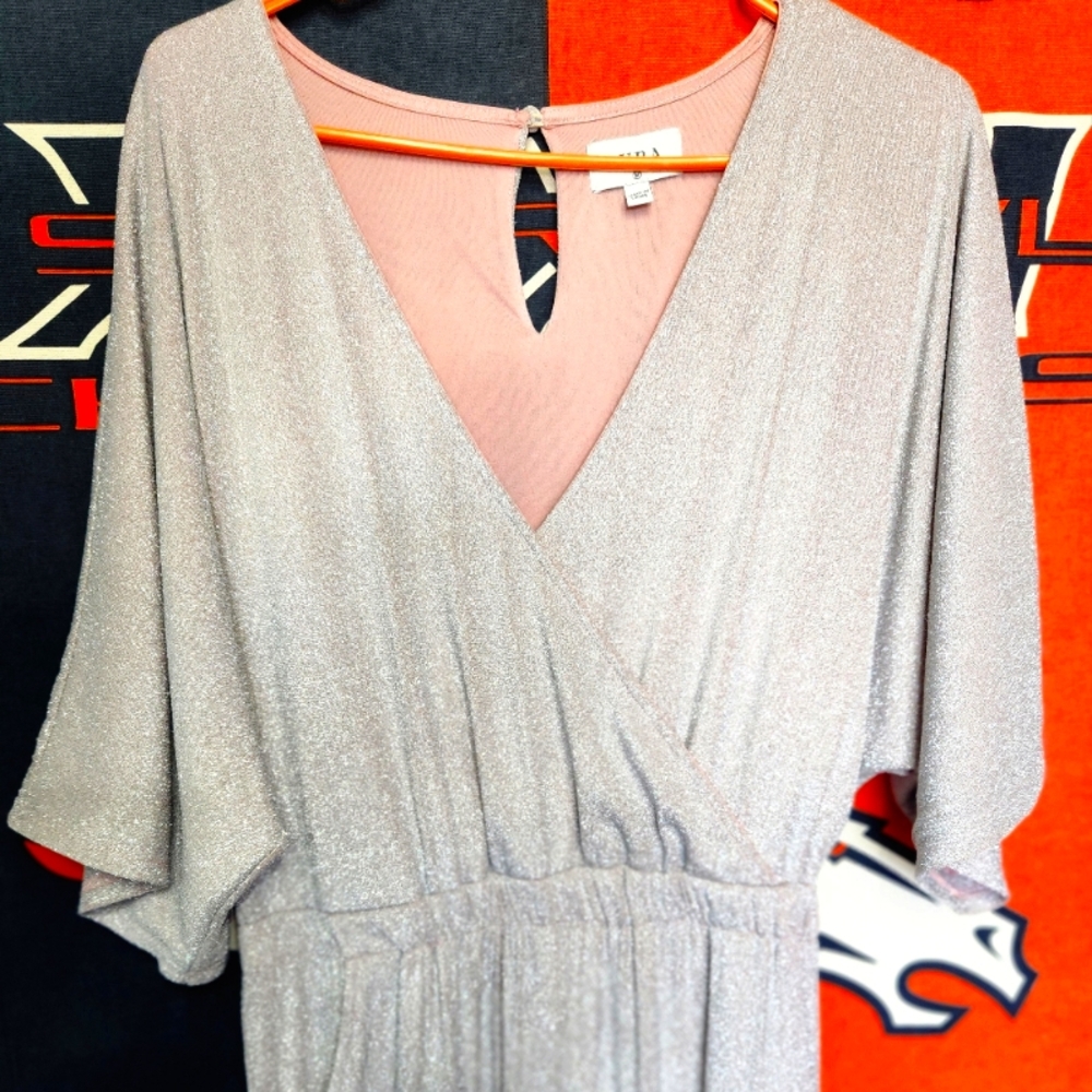 Periwinkle sparkly pink jumpsuit. With pockets